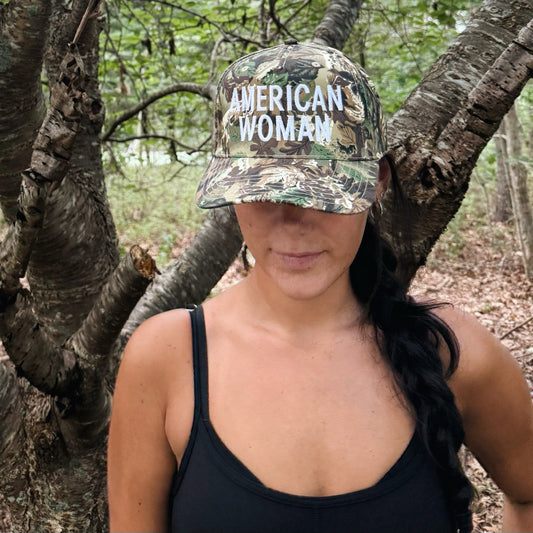 American Woman camo trucker hat
